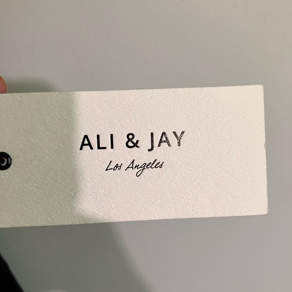 Ali and Jay black form fitting black dress with gold two way zipper on back - Picture 8 of 8